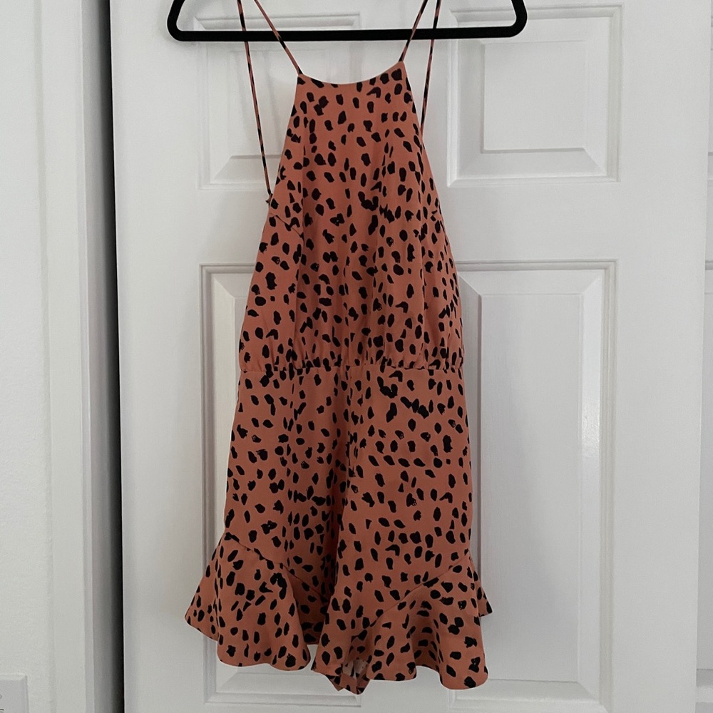 Cheetah Spotted Romper size small, ties in back.